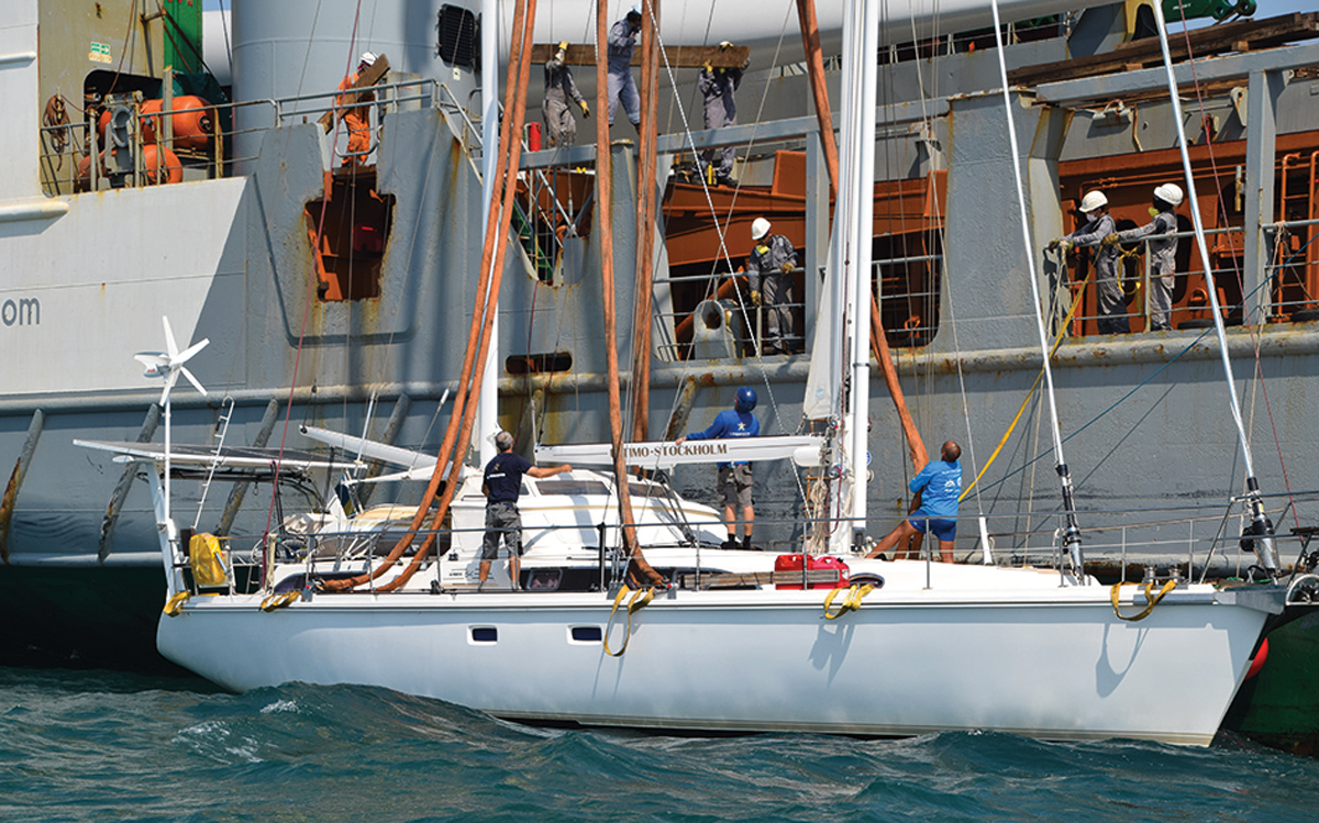 how-to-sail-across-the-indian-ocean-Amel-56-Ultimo-transport-ship-loading