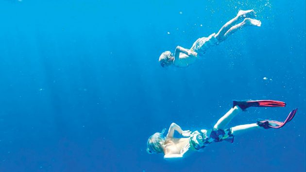 The Bubb children enjoying some freediving. 