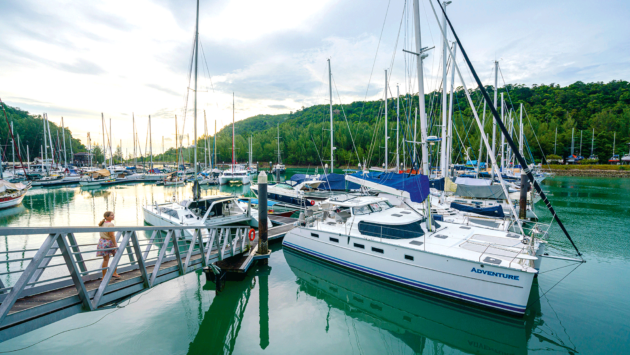Ask local cruiser groups if anyone can view the potential yacht for you before you travel.